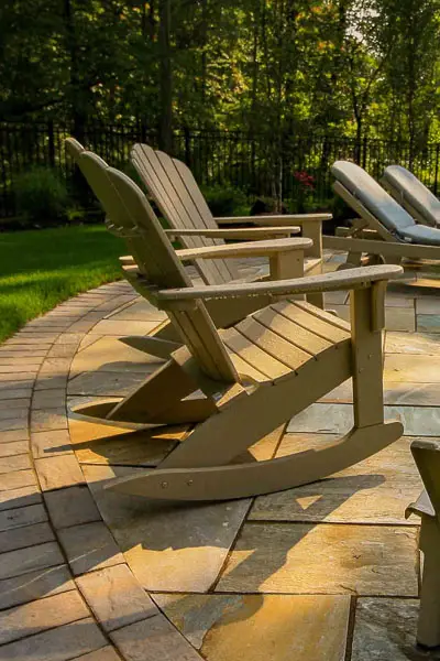 Backyard patio, seating area, and landscaping. flagstone