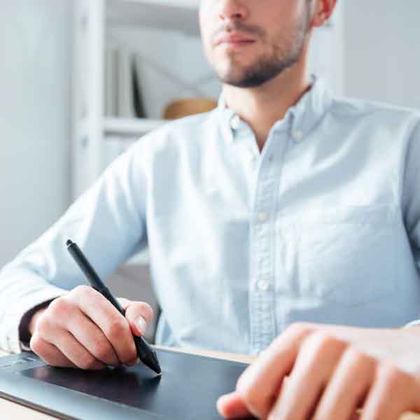 Landscape designer using a tablet for landscape design