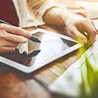 Landscape Designer working with tablet and laptop