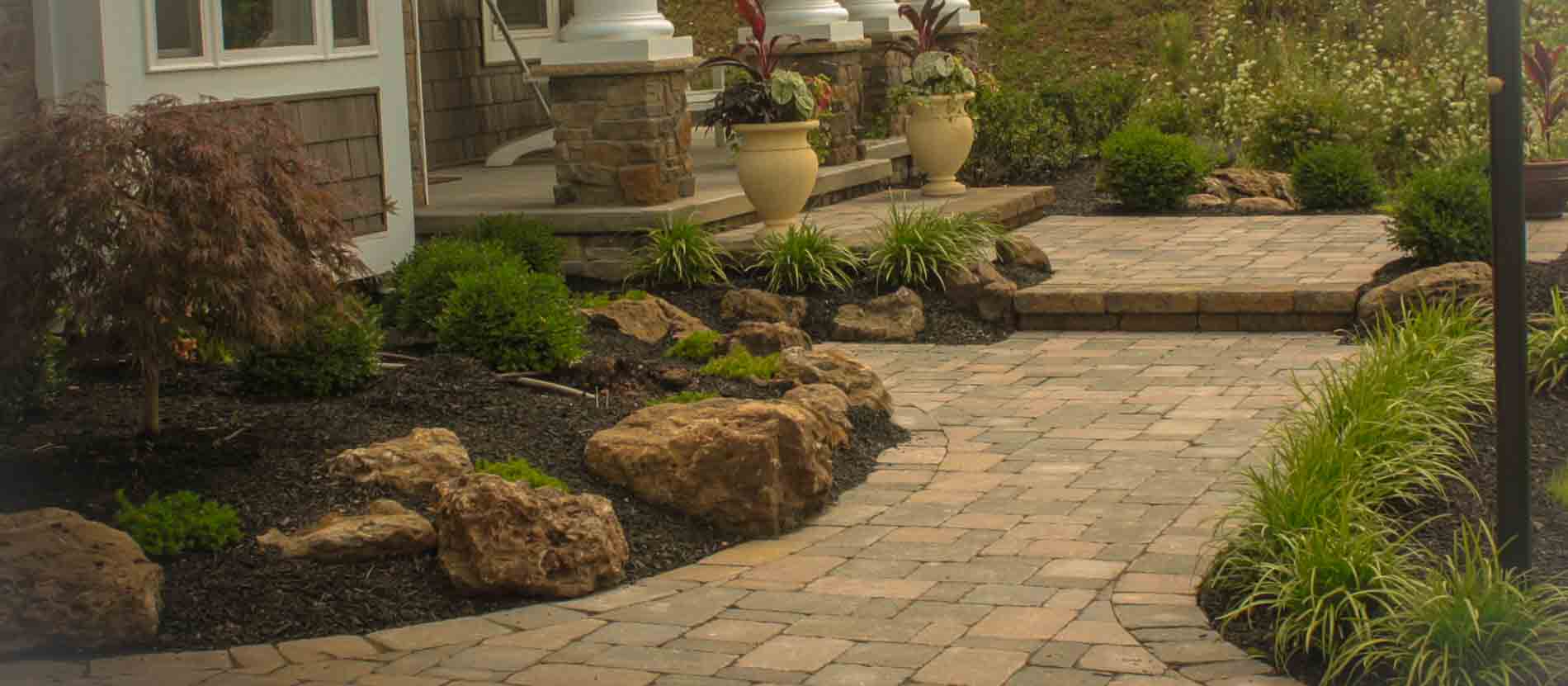 Front yard Landscaping, paver walkway, natural boulders