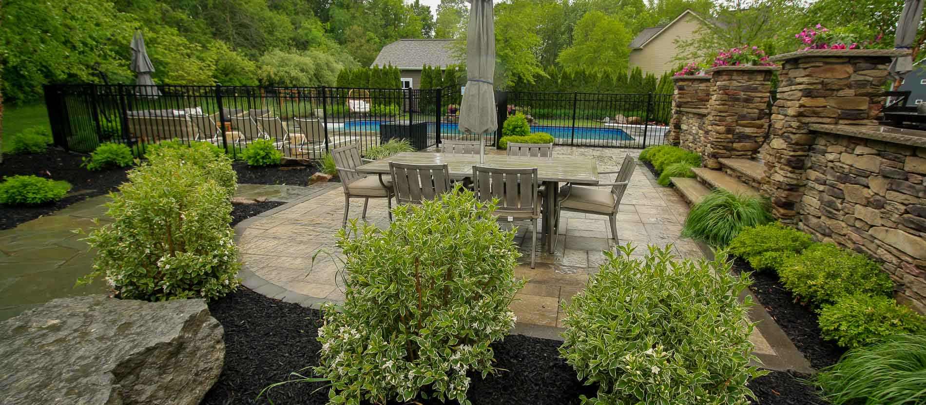 Backyard Landscaping, flagstone patio in Rochester NY