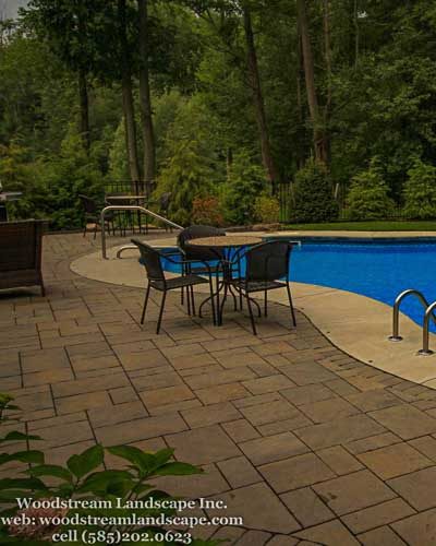 Landscaping and patio for pool in Webster NY