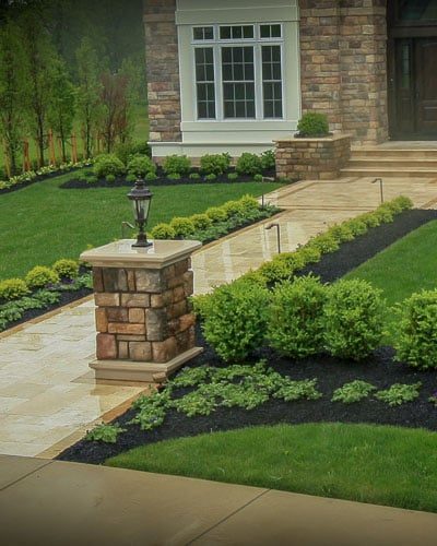 Front landscaping, stone pillar, Travertine walkway