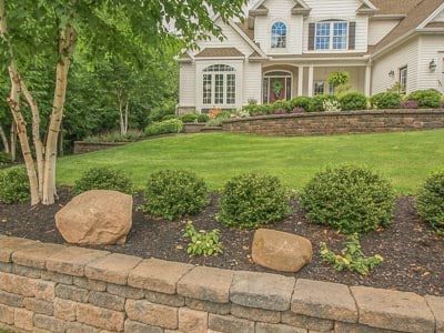 Retaining wall hardscape feature and front landscaping