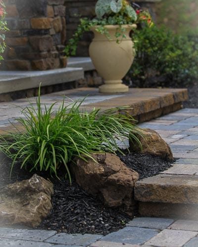 Boulders in a front landscape installation